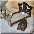 D05. Art nouveau owl bookstand and clip. 